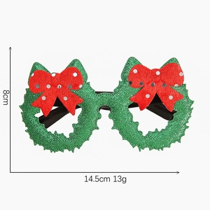 Detail showing dimensions 14.5x8cm of green sequin Christmas glasses with red bows