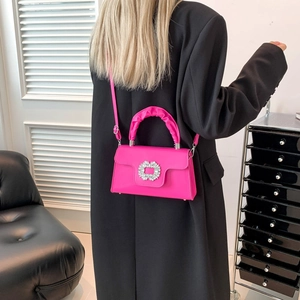 Fashionable rose pink crossbody bag with rhinestone buckle and pleated cloud handle