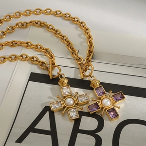 18k gold plated stainless steel cross necklace with purple zircon and central pearl