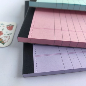 Minimalist American style grid paper notebooks in pastel pink, purple and cyan colors