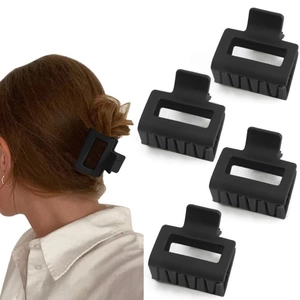 Matte black rectangular claw clip set for women showing hold on hair and product detail