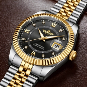 Detail of luxury men's two-tone steel watch with black dial and Roman numerals calendar