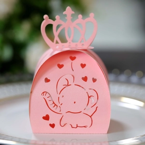 Pink elephant paper candy box with crown topper and hollow heart design for party