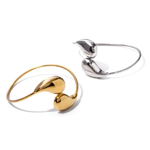 18k gold plated stainless steel open bangle featuring a minimalist teardrop design