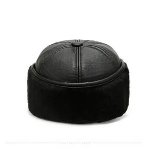 Detail view of the black leather winter cap back showing thick faux fur lining