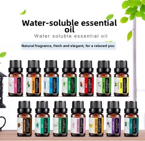 Set of 14 essential oil bottles in amber glass with natural botanical background