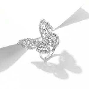 Detailed close-up of butterfly ring featuring sparkling zircon crystals and silver finish