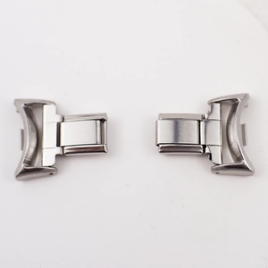 Symmetric pair of stainless steel smart watch link connectors on white background
