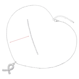 Detailed macro of a silver ribbon pendant necklace with pearls and fine bead chain