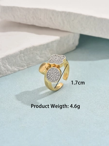 Detail showing two-tone gold-plated open ring with 1.7cm diameter and 4.6g weight