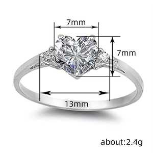 Minimalist heart-shaped silver ring with 7mm center stone and detailed measurements