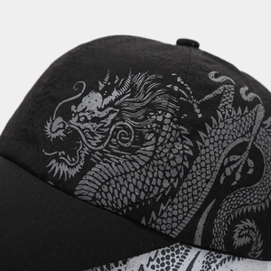 Breathable black mesh baseball cap featuring silver dragon print and white contrast panel