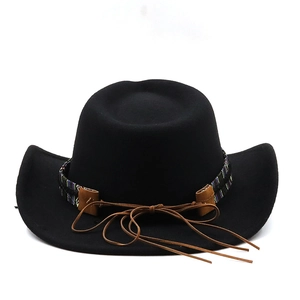 Detail of black wool felt cowboy hat with ethnic style ribbon and leather cord