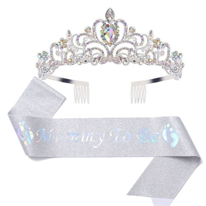 Detailed view of silver Mommy To Be sash with glitter finish and rhinestone tiara set