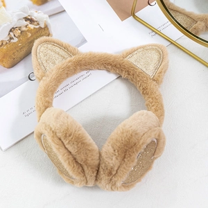 Detail of warm brown faux fur earmuffs with cute cat ears and golden glitter accents
