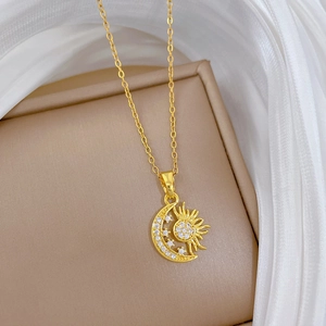 Titanium steel gold necklace with sparkling sun and crescent moon crystal pendant