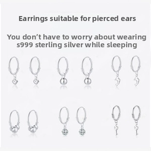 Detailed collection of S999 sterling silver hoop earrings with various charms and pendants