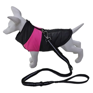 Detail view of pink and black waterproof dog winter jacket with integrated harness and D-ring