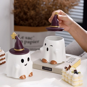 Cute Halloween ceramic ghost mugs with purple wizard hats, perfect for coffee or milk