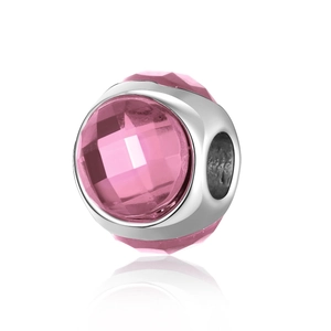 Macro view of pink faceted crystal bead with silver metal frame for DIY jewelry making