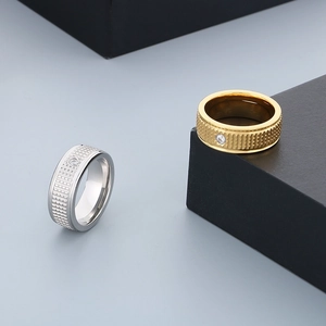 Minimalist titanium steel ring set in gold and silver with elegant diamond inlay detail