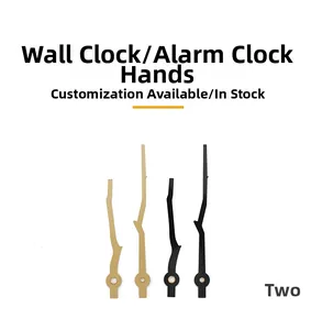 Detail of tree branch shaped clock hands in gold and black finishes for DIY clock repair