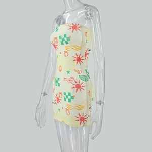 Detail view of tube top dress with summer sun, lemon, and checkerboard print pattern