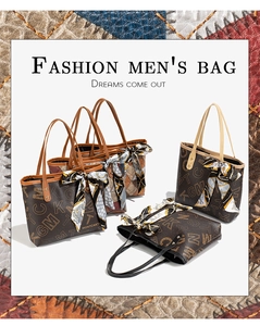 Detail view of large tote bag with silk scarf ribbon and classic GMKT letter prints