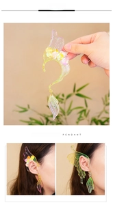 Detailed close-up of DIY resin ear cuffs with butterfly wings and gradient glitter effect
