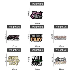 Colorful enamel pins with Jesus slogans and product dimensions for clothing and bags