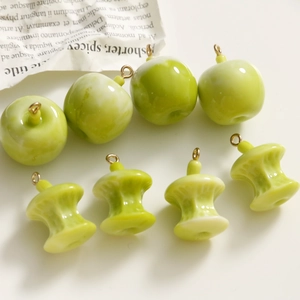 DIY green resin apple and core charms with gold hooks for jewelry making and crafts