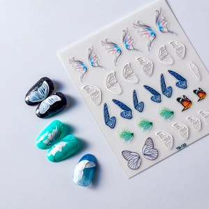 Macro detail of 5D embossed butterfly wing nail stickers with realistic 3D textures