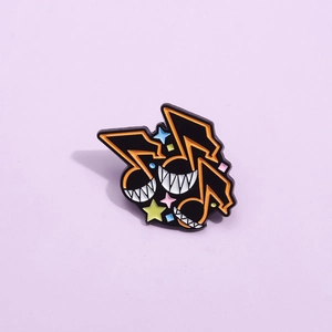 Pin's en émail inspiré de jeux animés avec une note de musique noire et des étoiles