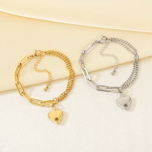 Bracciale a catena cubana placcato oro e argento con ciondolo a cuore su seta