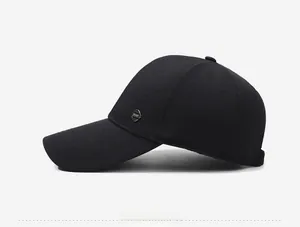Detailed side view of black baseball cap featuring a silver metallic Sport emblem
