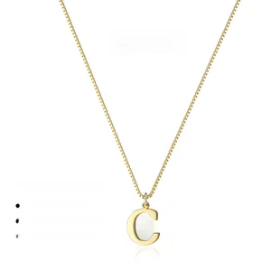 Detail of 14k gold plated letter C pendant on a box chain with 15.74 inch length