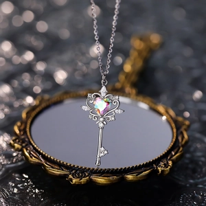 S925 sterling silver key necklace with heart-shaped iridescent stone and cubic zirconia