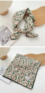 Floral cotton linen square scarf with green lace trim shown in a lifestyle flat lay