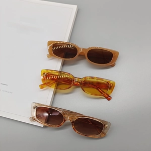 Retro square sunglasses for women in tortoiseshell and amber frames with UV protection