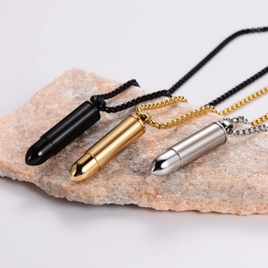 Men's stainless steel bullet pendant necklaces in black, gold, and silver finishes