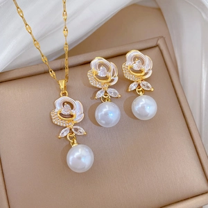 Luxurious gold flower jewelry set with sparkling crystals and elegant white pearls