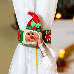 Detail of gingerbread man curtain buckle with red hat and scarf on white curtain