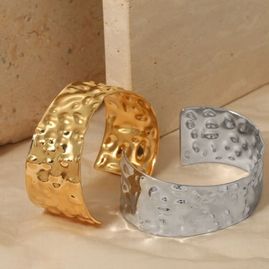 Irregular hammered stainless steel open cuff bracelet in gold and silver finish