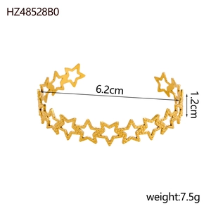 Detailed view of vintage gold hollow star cuff bracelet with dimensions 6.2cm and 1.2cm
