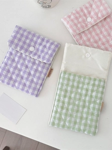 Pastel quilted cotton sanitary storage pouch set with white snap button and brand label