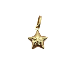 Golden stainless steel star pendant with embossed face design on a white background