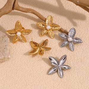 Elegant 18K gold and silver plated plumeria flower earrings with center pearls