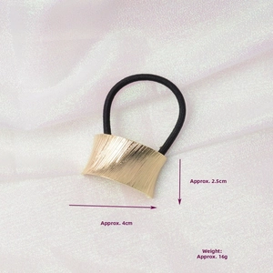 Detail view of gold brushed metal hair cuff with elastic band, size 4x2.5cm, weight 16g