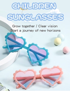 Detail of pink and blue gradient heart sunglasses with glittery lace frames for kids