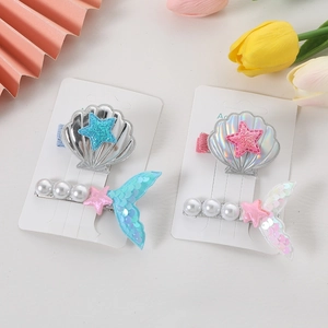 Kids mermaid shell hair clips with pearls and sequins in a two-piece accessory set